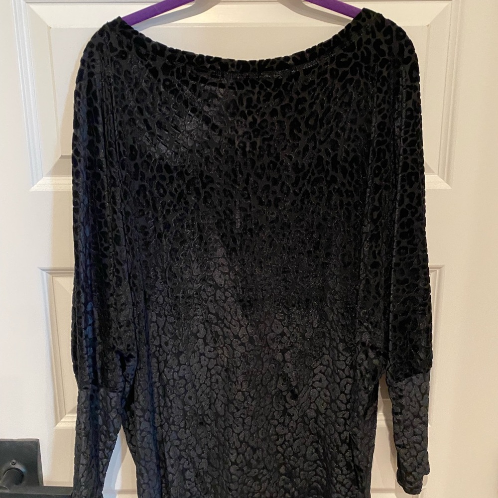 Size large animal print top.